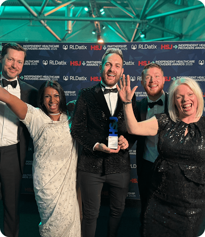 Group of people in smart clothes celebrating